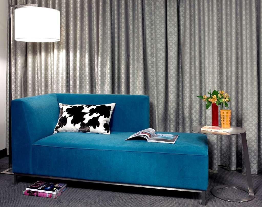 טקומה Hotel Murano חדר תמונה A blue chaise longue